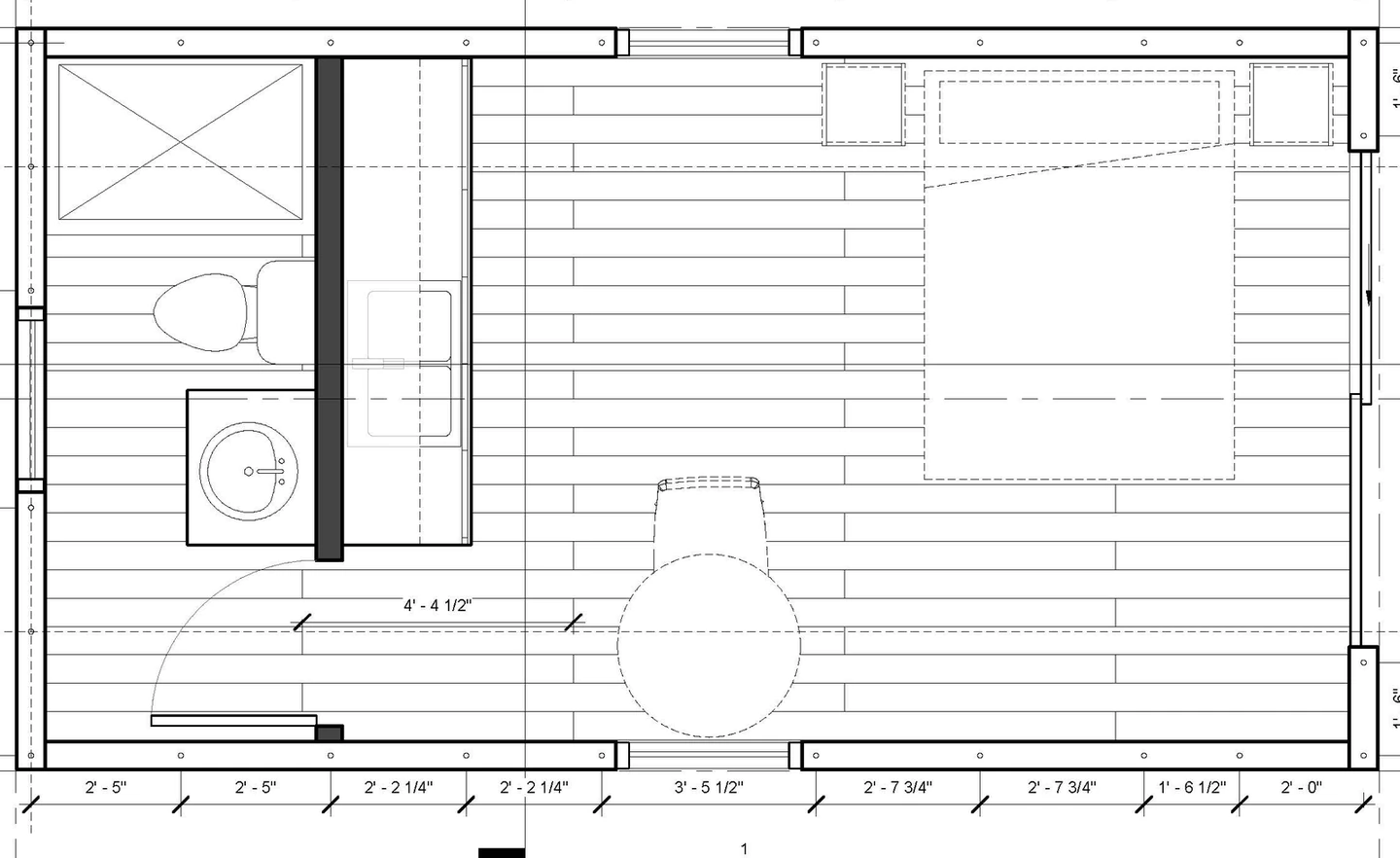 Floor plan of the 240 sq ft studio: a bathroom with shower, toilet and sink at one end, a kitchen counter, and an open room with a bed and a small table