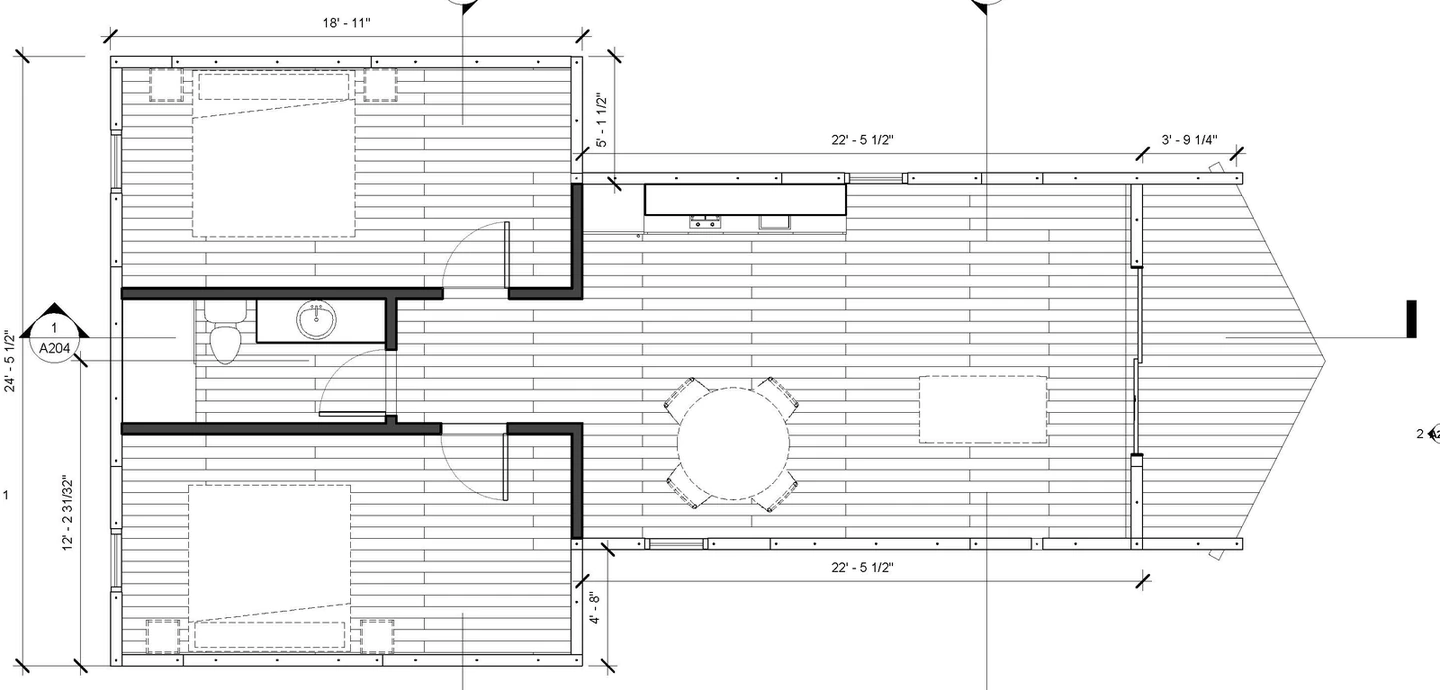 Floor plan of the 800 sq ft two-bedroom: a bedroom wing with two bedrooms and a bathroom between them, opening onto a long great room with a kitchen along one wall and a dining area